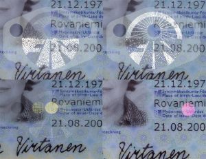 FIN-AD-04001 - 
<Integrovan&aacute; karta s osobn&iacute;mi &uacute;daji - předn&iacute; strana (totožnost)> - OVD - opticky proměnliv&yacute; prvek