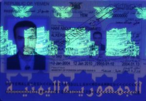 YEM-AS-01001 - 
<Pagină cu date de identificare> - Element vizibil la lumină UV